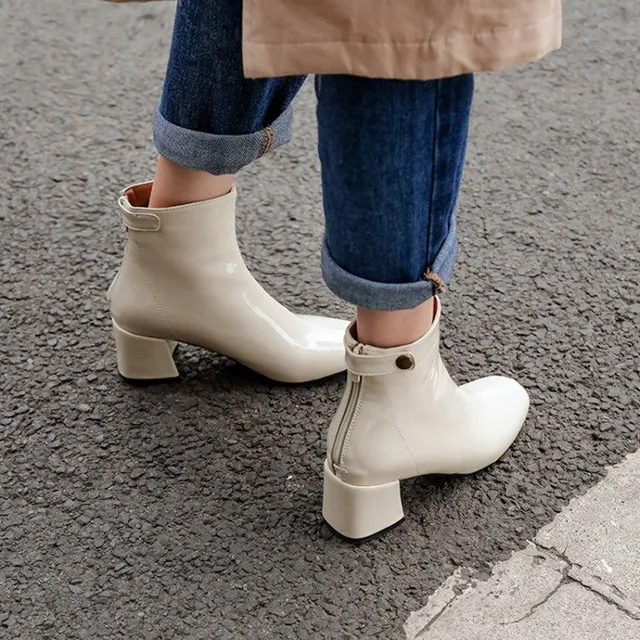 Women's winter ankle boots with square heels made of artificial leather