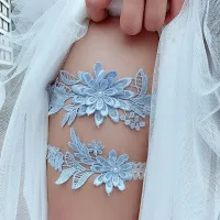 Lace wedding garters in beautiful elegant colors
