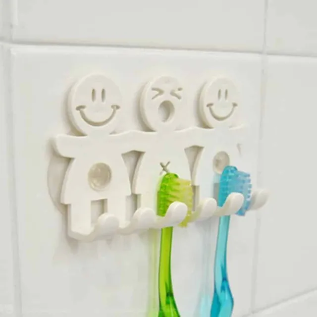 Wall bracket for toothbrushes