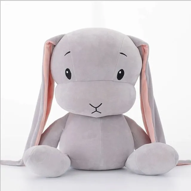 Joli lapin en peluche disponible en trois couleurs