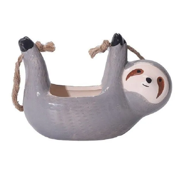 Decorative flower pot in the shape of a sloth