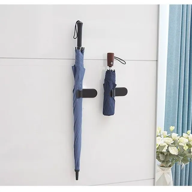 Self-adhesive umbrella holder