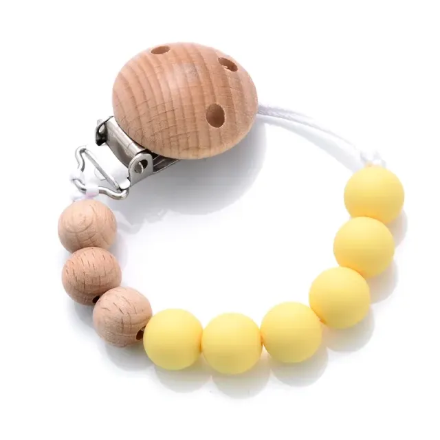 Wooden pacifier clip with silicone bite and round beads