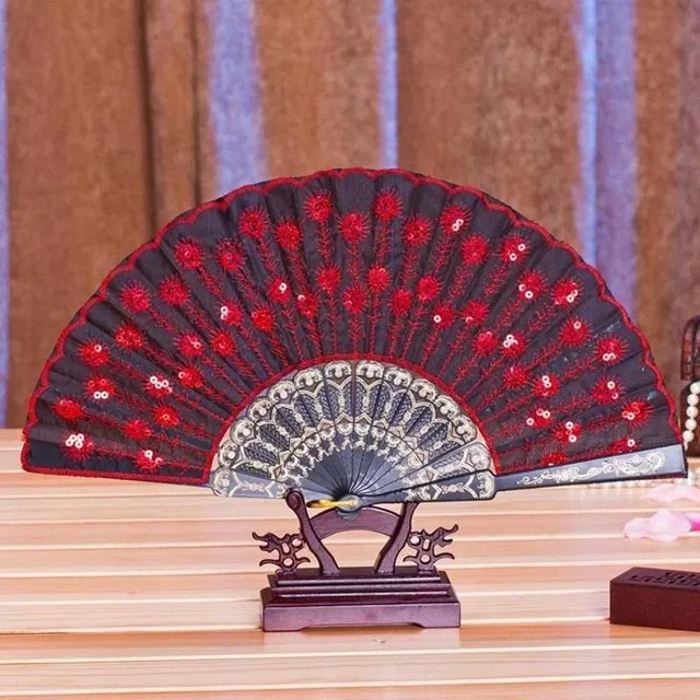 Fan with theme of peacock pens