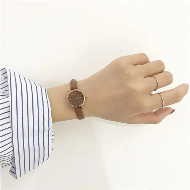 Ladies small watch with leather strap