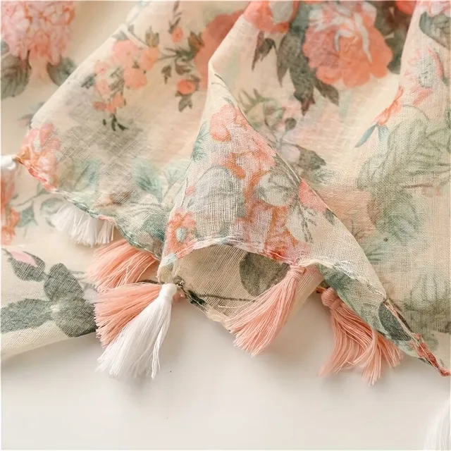 Light summer scarf with fringes and floral pattern