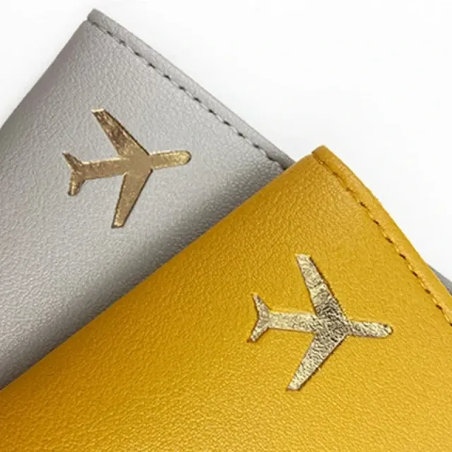 Fashion travel cover for PU leather passport with engraving of aircraft motive - passport protection and credit cards