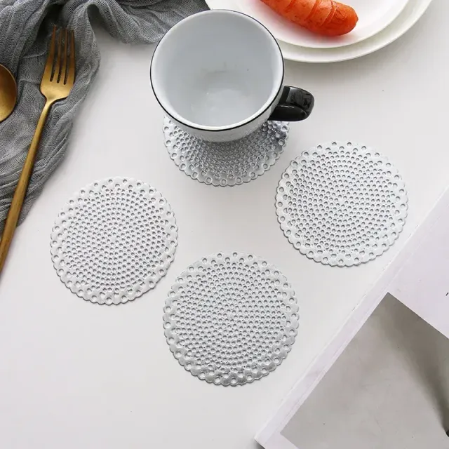 1 piece of PVC beverage coaster with anti-slip coating on the dining table