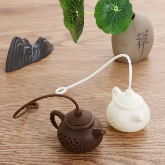 Modern silicone tea sieve in the shape of a tea pot - more colored variants