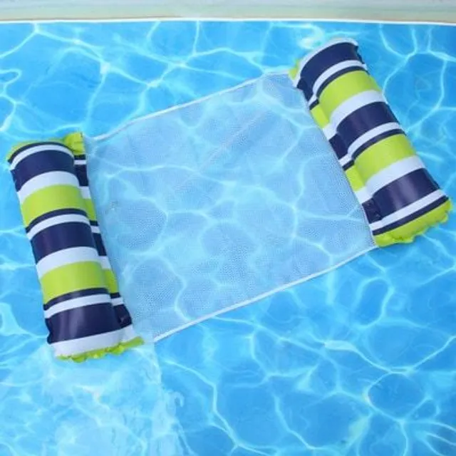 Foldable inflatable lounger for water