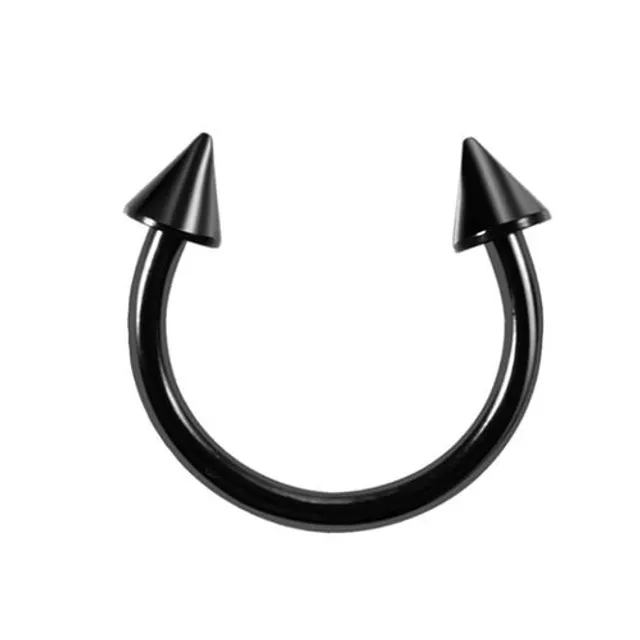 Trendy septum nose piercing with a spike or ball