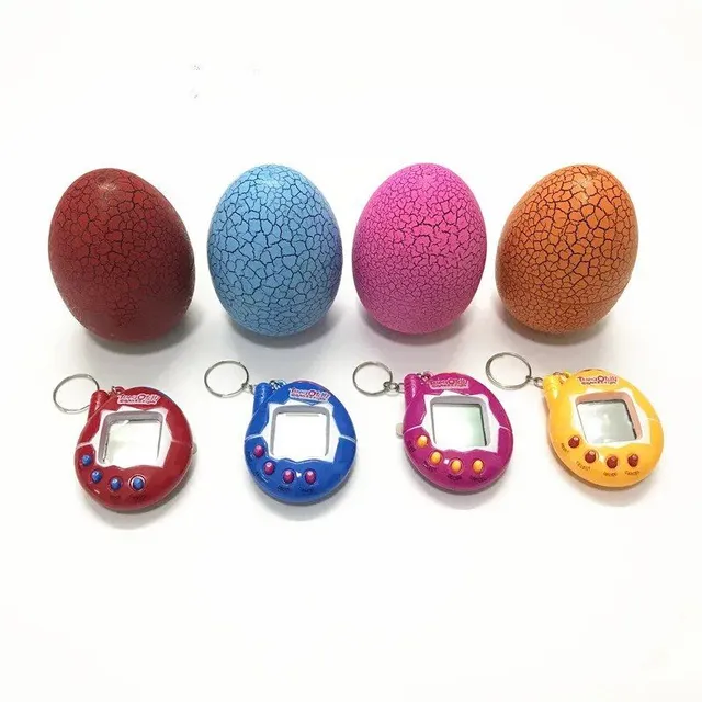 Colored egg with Tamagochi dinosaur - virtual electronic pet - manual digital game