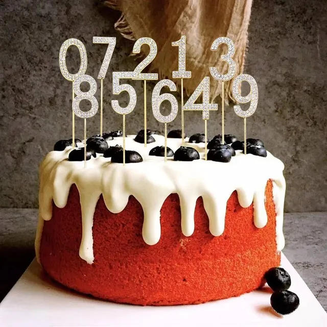 Decoration of cake with glittering zirconium - numbers