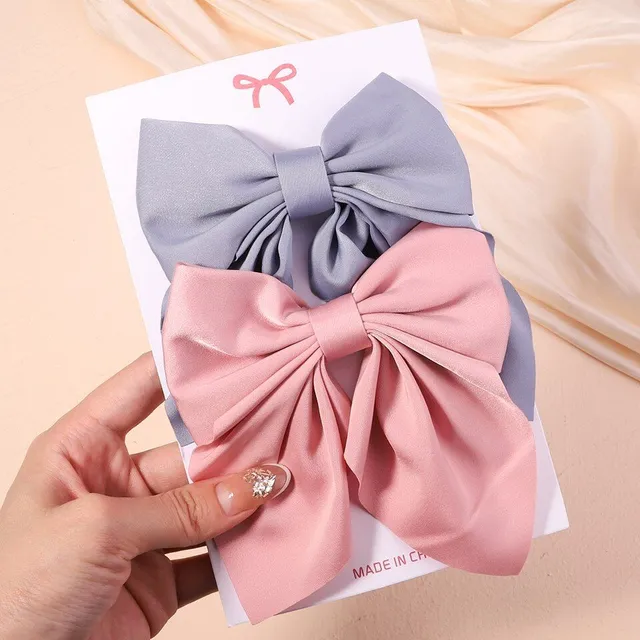 Cute modern baby hair clip with perfect bow motif - more variants