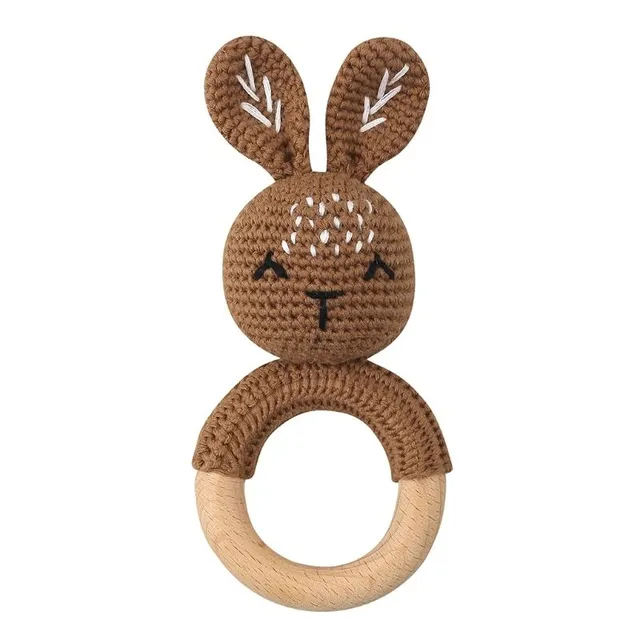 Cute crochet rattle with wooden holder