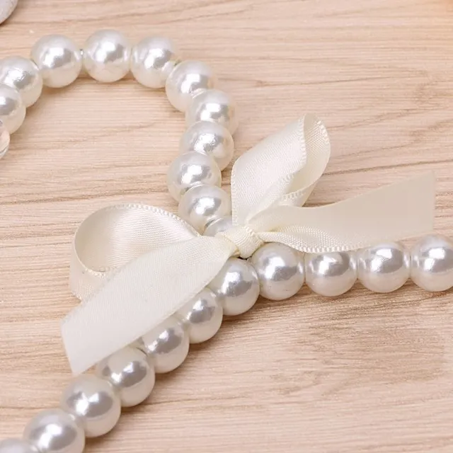 Decorative hanger with pearls