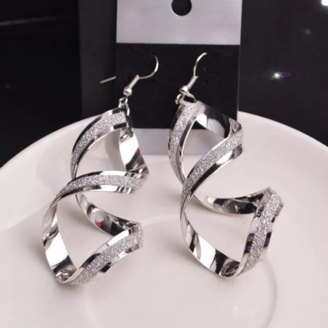 Women's social luxury original earrings in two variants