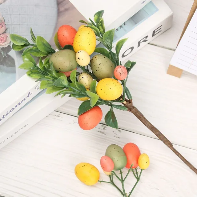 Easter decorative branch with artificial coloured eggs