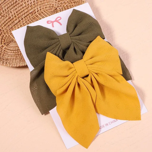 Cute modern baby hair clip with perfect bow motif - more variants