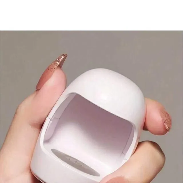 Mini UV/LED gel nail lamp with quick curing for home manicure