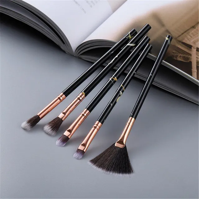 Set of make-up brushes in marble design