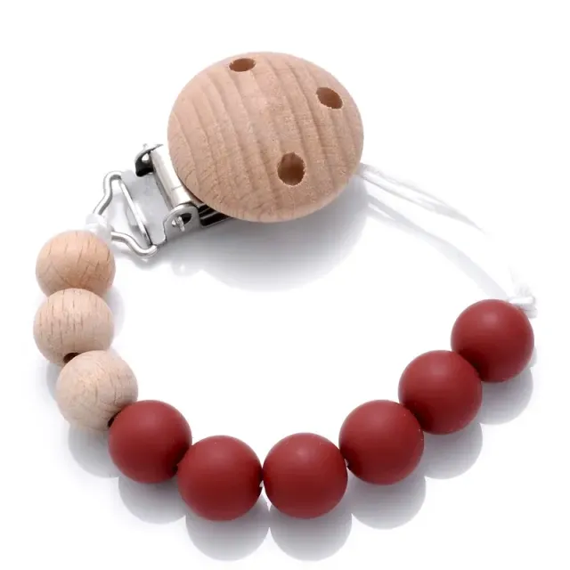 Wooden pacifier clip with silicone bite and round beads