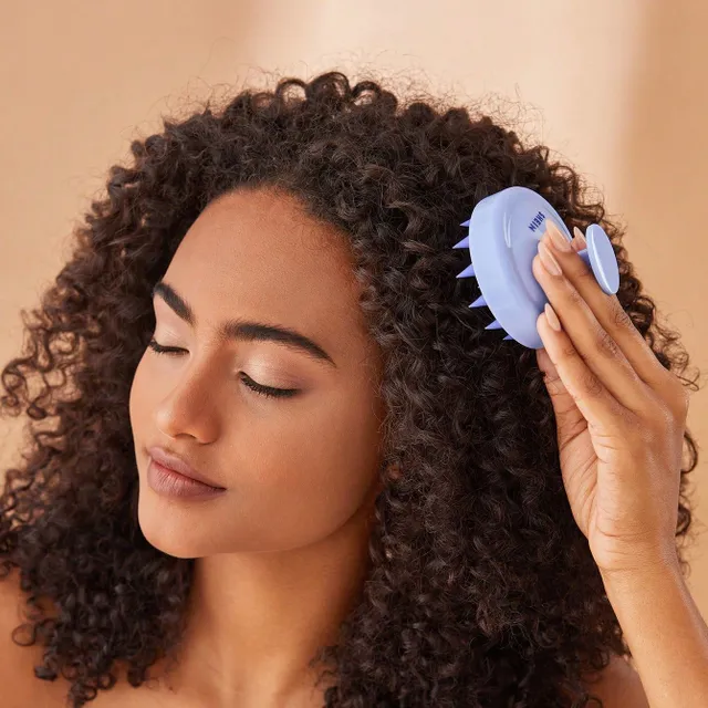 Massage and exfoliating silicone hairbrush - care for healthy and shiny hair