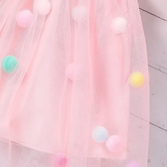 Girl's tutu skirt in tulle with colourful plush balls