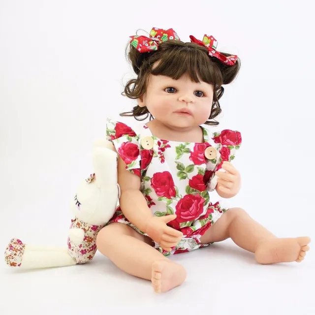 Realistic doll with accessories 55 cm