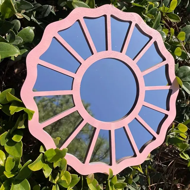 Decoration of a window in the shape of a sun flower