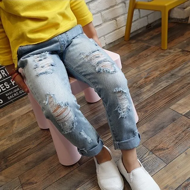 Boy's torn jeans