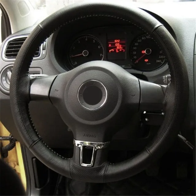 Quality steering wheel cover including needle and thread