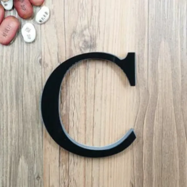 Decorative minimalist single-colored letters with light reflection for beauty of home