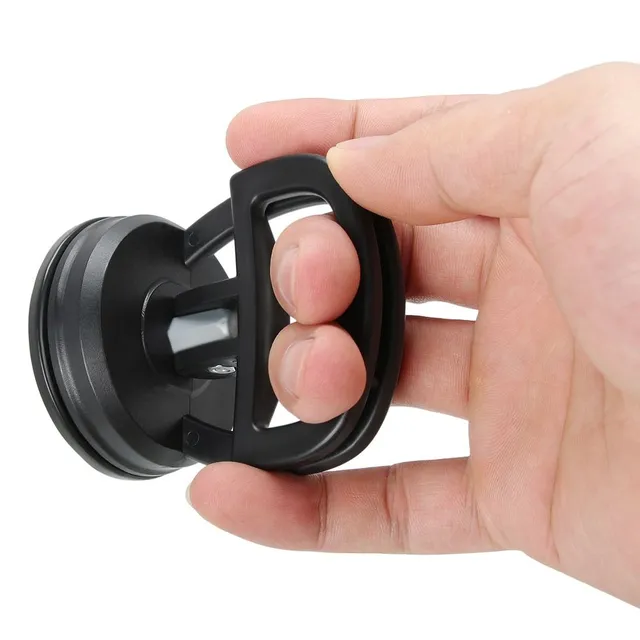 Suction cup for repairing dents