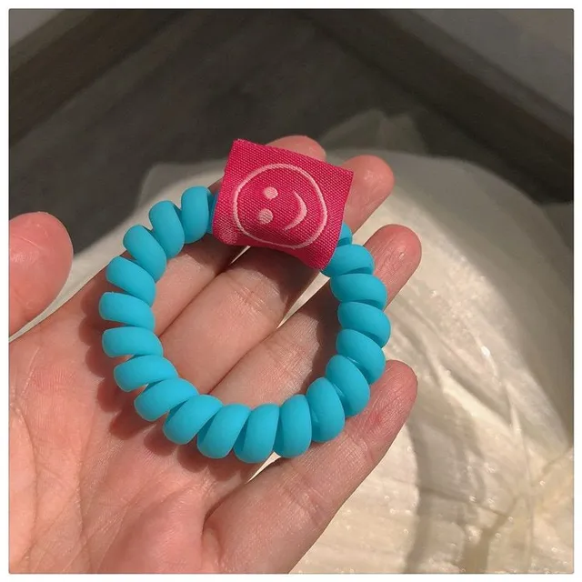 Fluorescent spiral rubber with smiley face