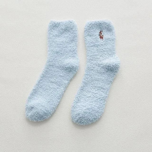 Warm socks in the shape of a paw