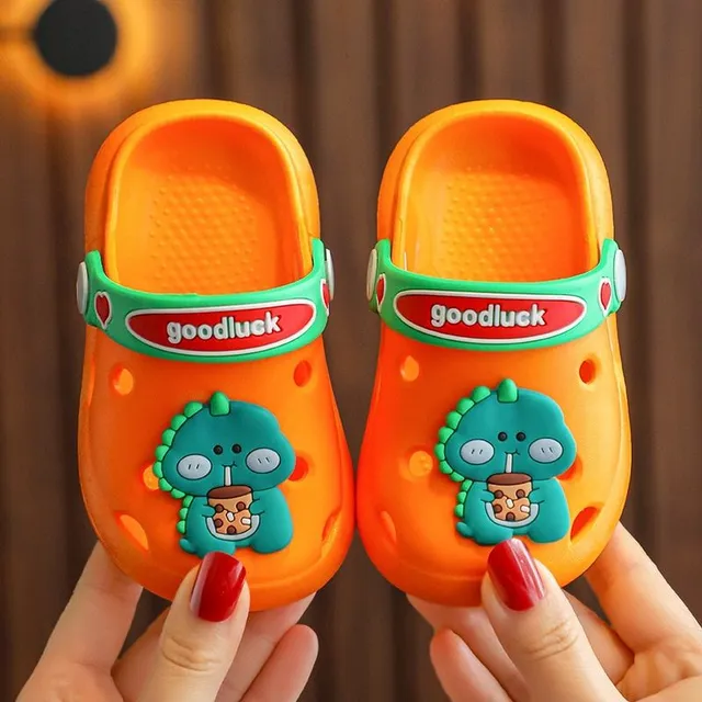 Children's perforated foam slippers with cute accessory