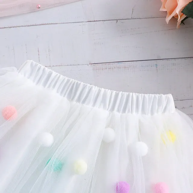 Girl's tutu skirt in tulle with colourful plush balls