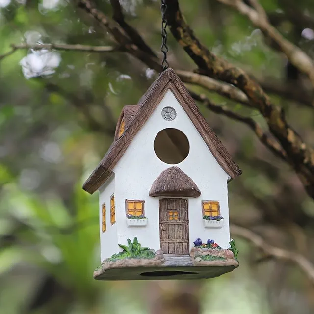 Rustic hanging house for birds for outdoor garden