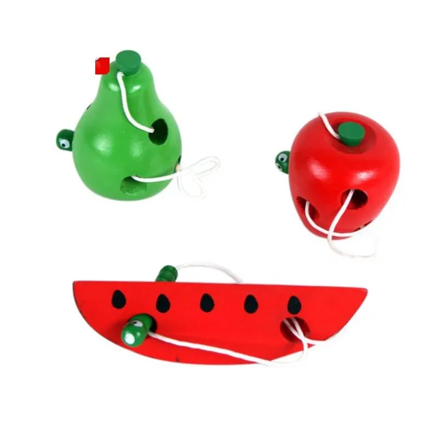 Wooden toys in the form of fruit for stringing