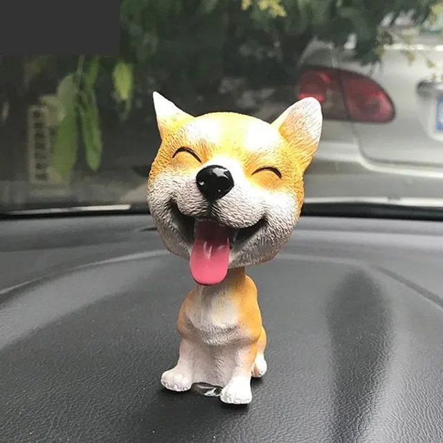 Psy z głową uśmiechniętą w samochodzie Max yellow