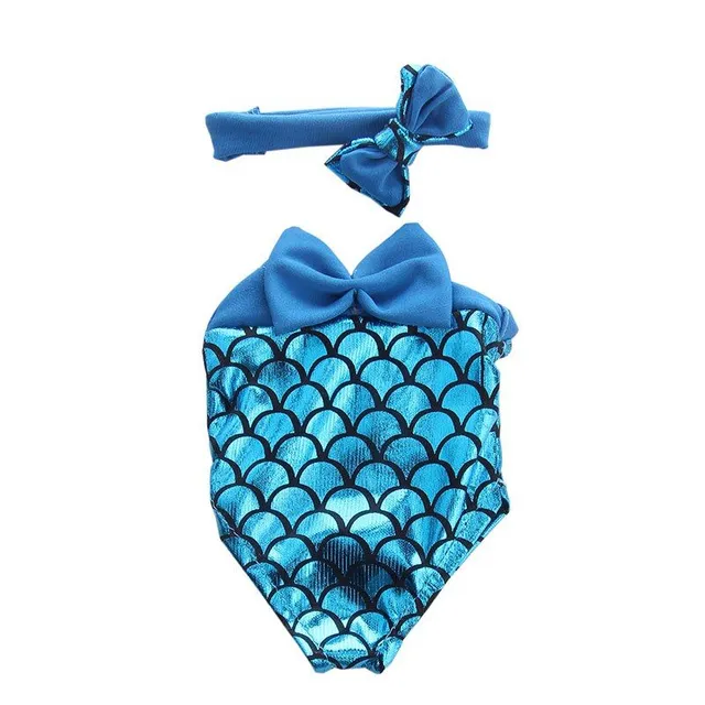 Swimwear for a doll with a mermaid pattern