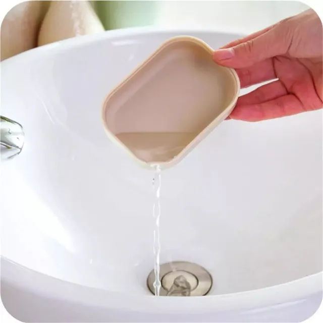 Two-layer elegant drain container for soap