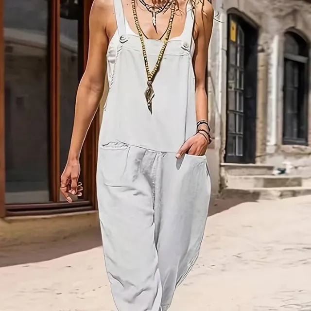 Women's sleeveless jumpsuit with pockets on the front - solid colour