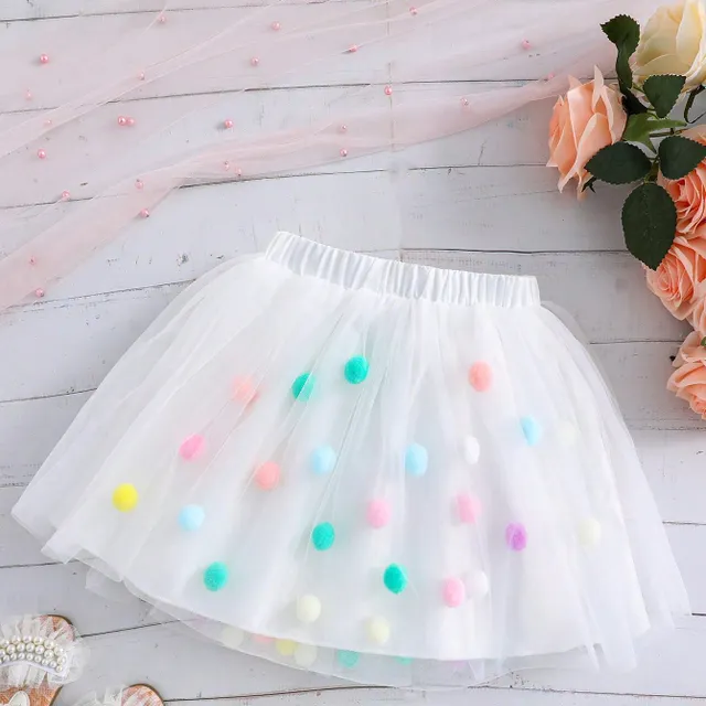 Girl's tutu skirt in tulle with colourful plush balls