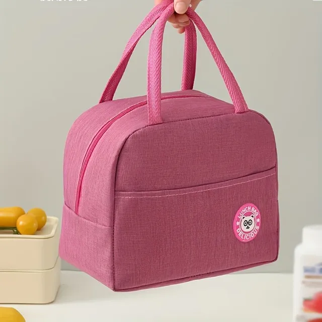 Practical insulated lunch bag with cheerful motif, handles and thermal insulation