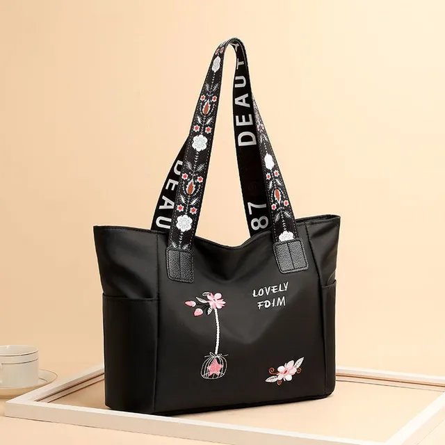 Women's fashion shoulder bag with simple flower print