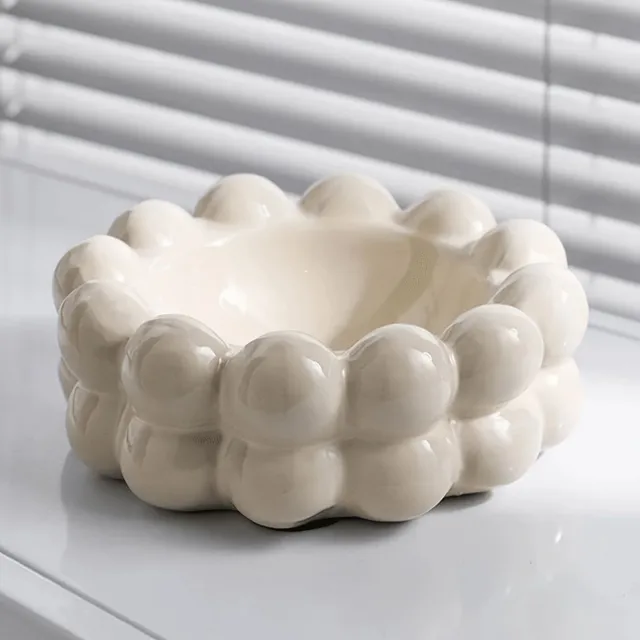 Stylish ceramic ashtray in the shape of a cloud