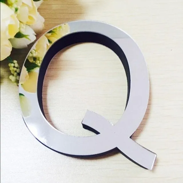 Adhesive mirror letters on the wall q