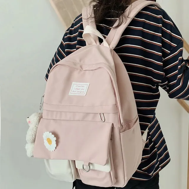 Women's backpack with teddy bear pendant